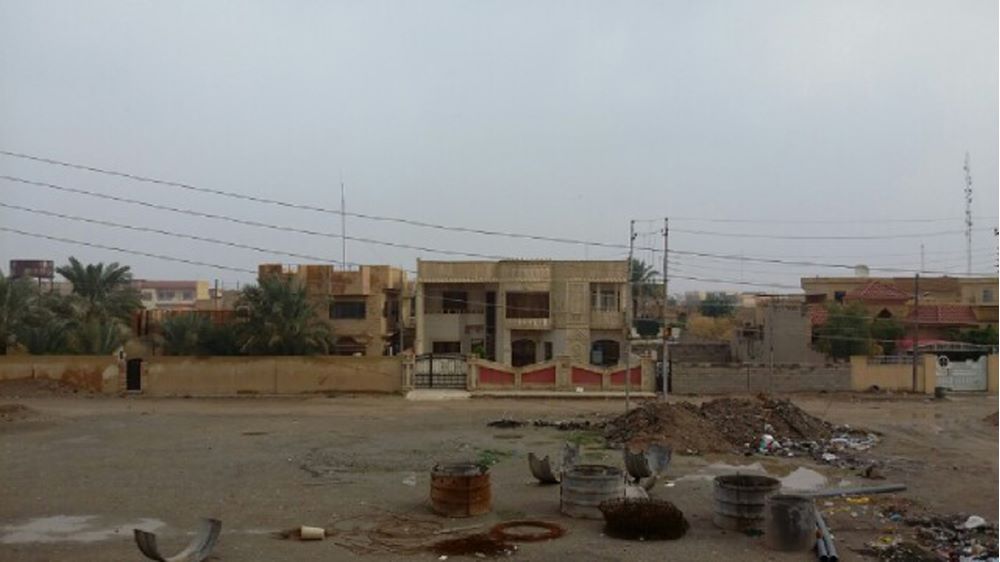 En plats med hus, vägar och grusplan i Irak eller Syrien.